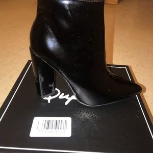 Women’s black bootie heels